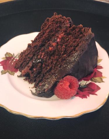Avocado and chocolate cake with fresh raspberries - vegan